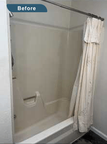 A before picture of a bathtub with shower.
